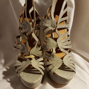 Silver glittery platform heels.